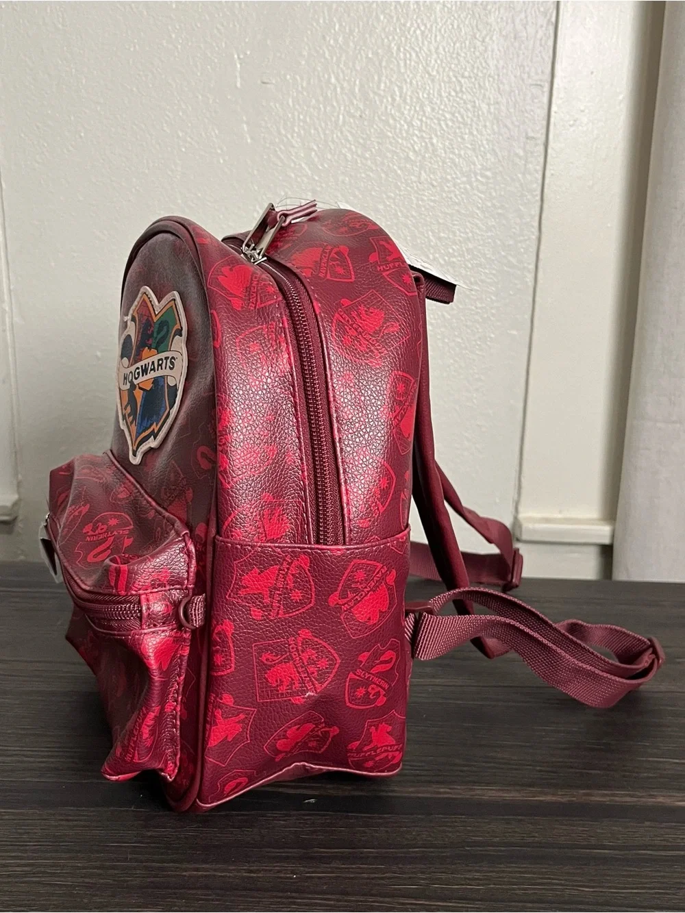 Maroon red faux leather Harry Potter Hogwarts mini backpack ft crest applique